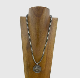 Silver
Navajo Pearl with Metal Cross
Pendant Necklace