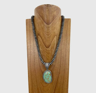 21 inch Silver Roundel Navajo
Pearl Bead with Green Stone
Pendent Necklace